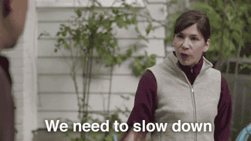 Carrie Brownstein in Portlandia tells someone to slow down. 