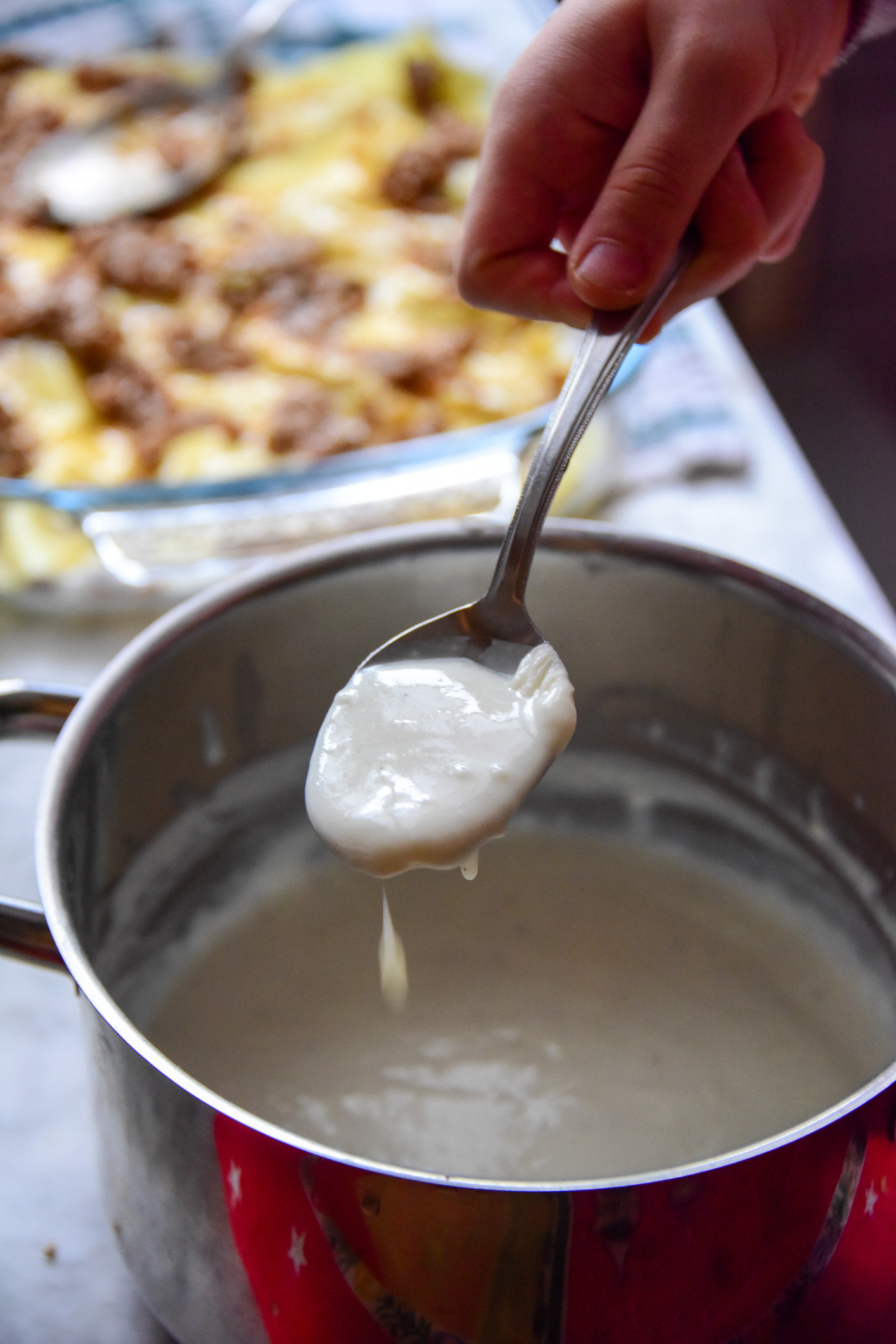 Spoonful of bechamel sauce